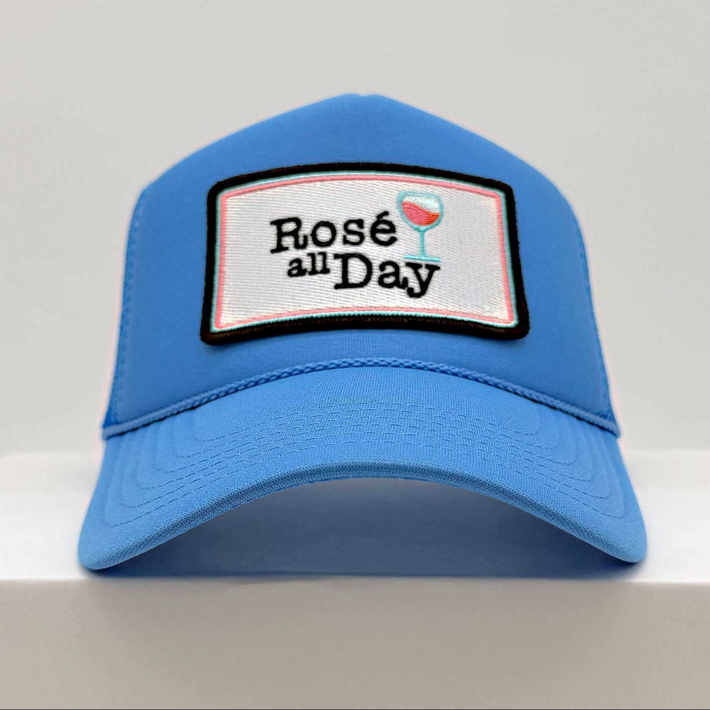 Port Sandz Rosé all Day Light Blue Trucker Hat Front