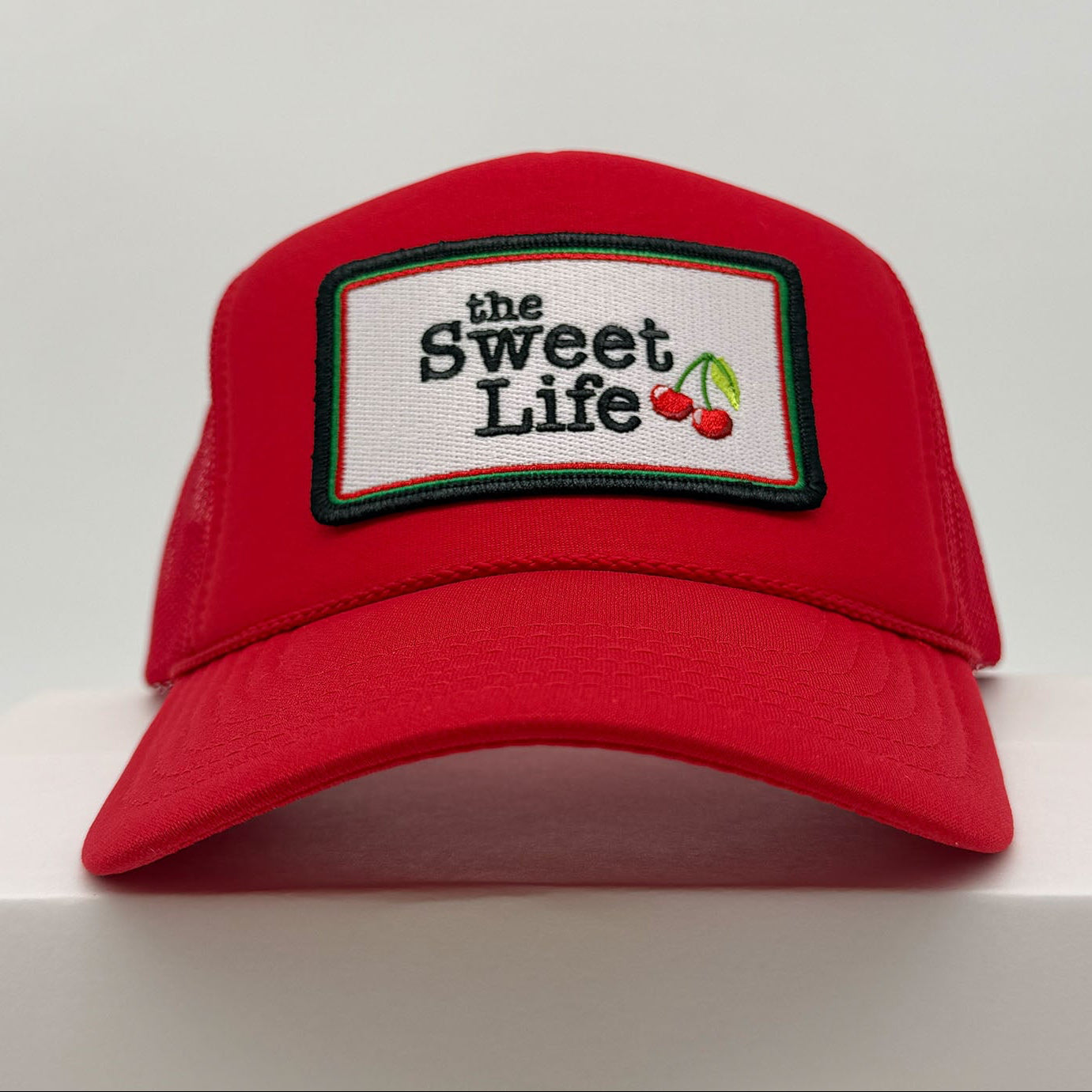 Port Sandz the Sweet Life Red Trucker Hat front